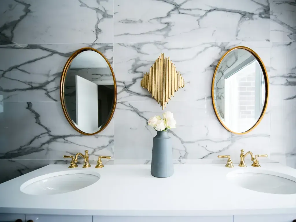 Bathroom remodel in San Antonio Tx — a craftsperson easing the last imperfection out of the work by hand
