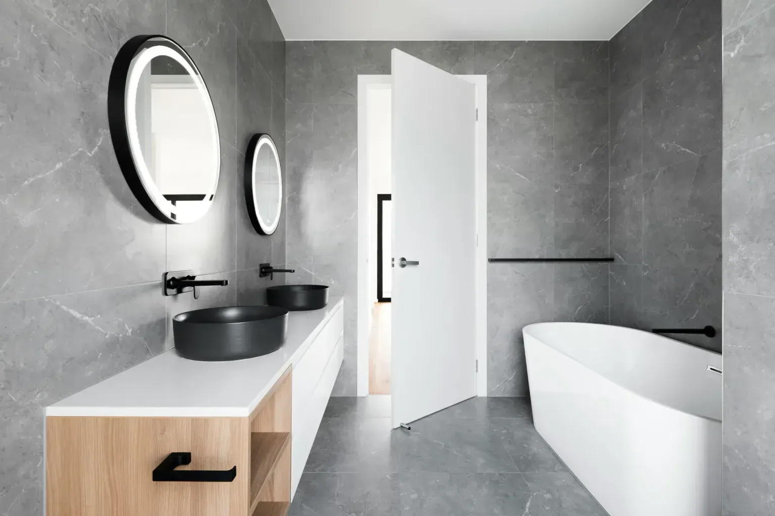 Bathroom remodel for elderly — a bright nearly complete room with the work expertly finished